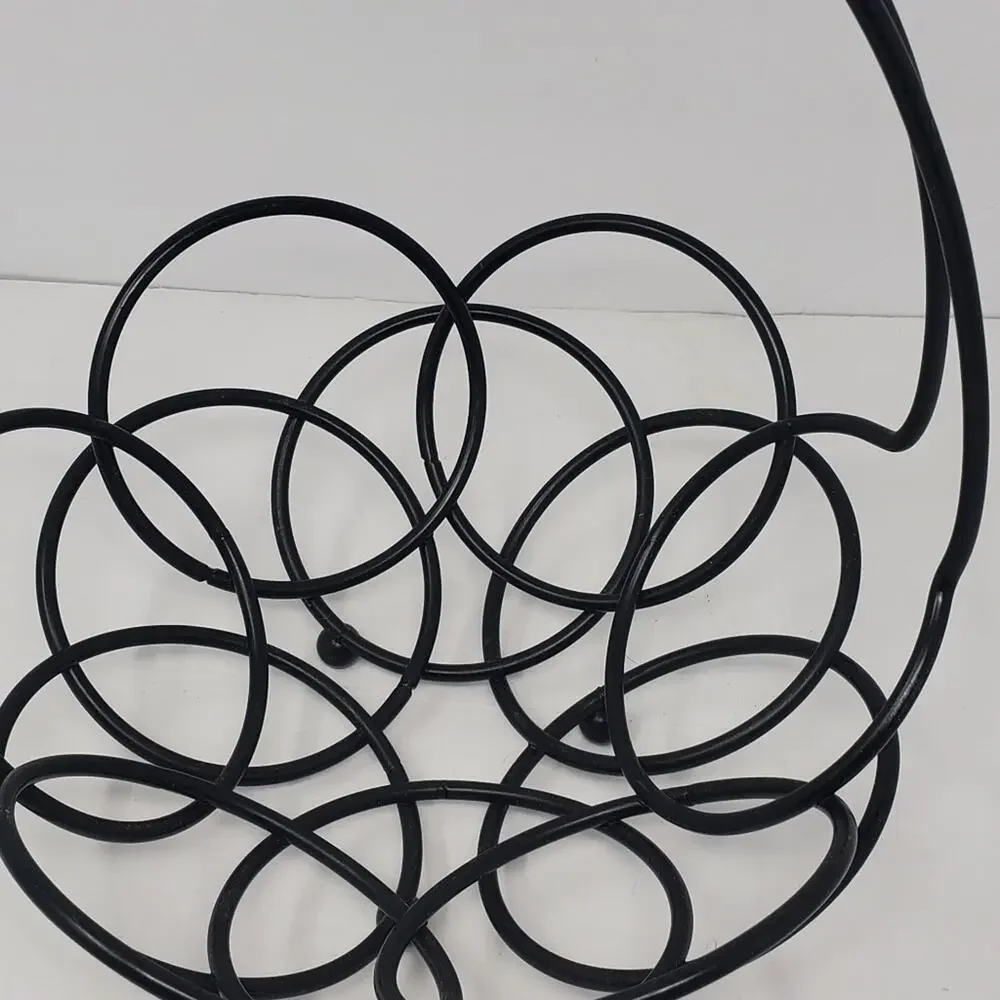 Vintage Wrought Iron Banaba hanger and fruit bowl in circular pattern